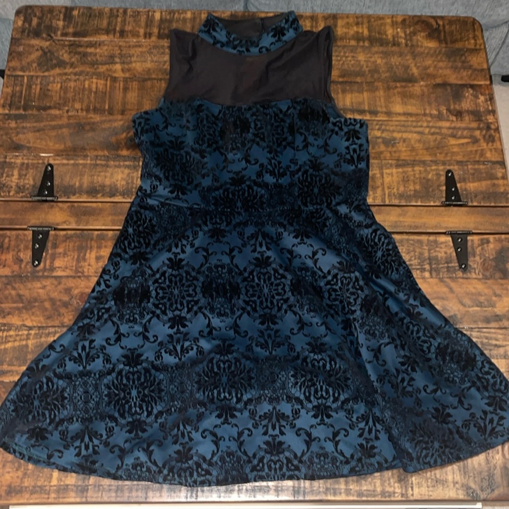 Here we have a velvet short dress with a halter